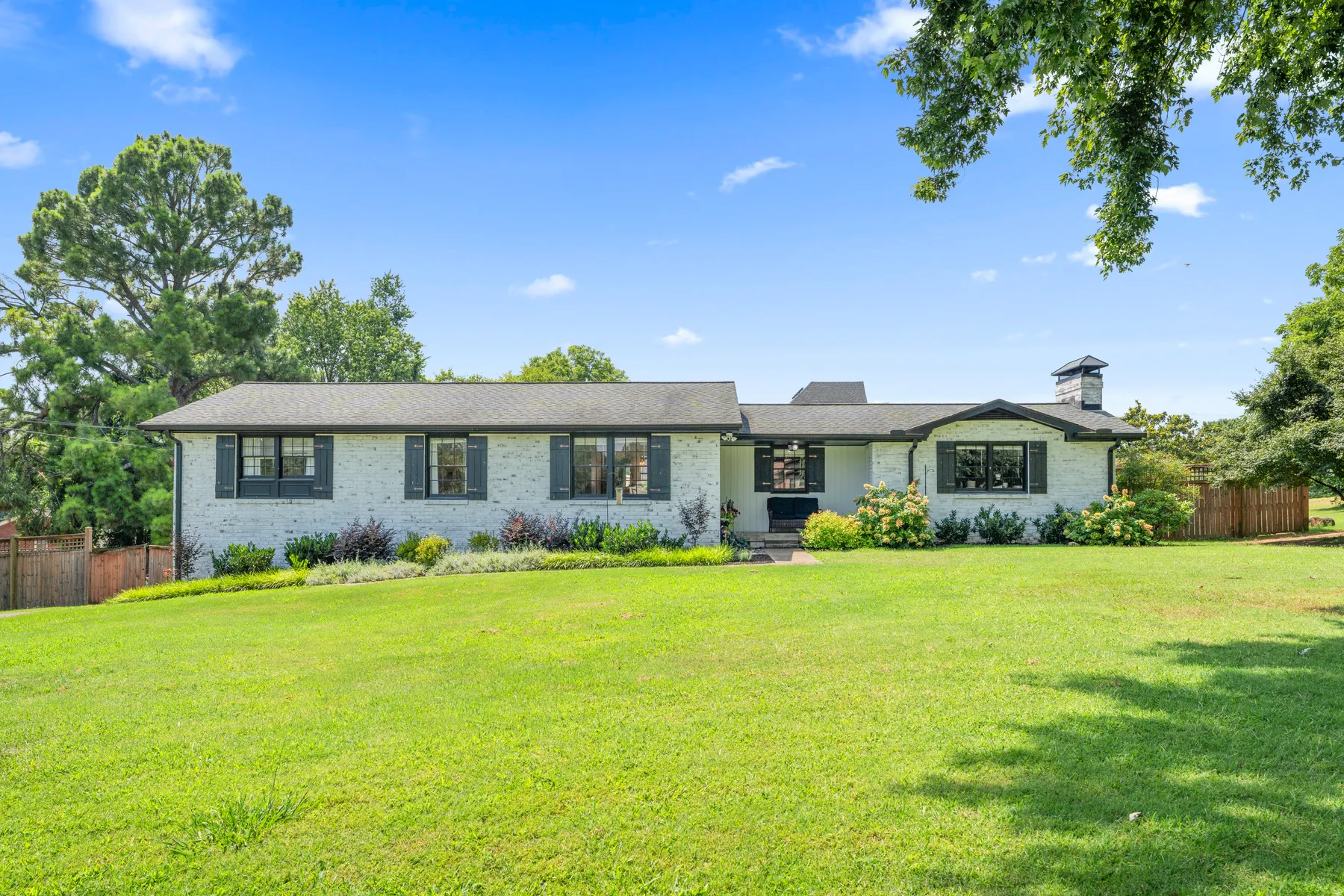 Single-level brick ranch at 2460 Fairbrook Drive, Nashville, set on a landscaped lot