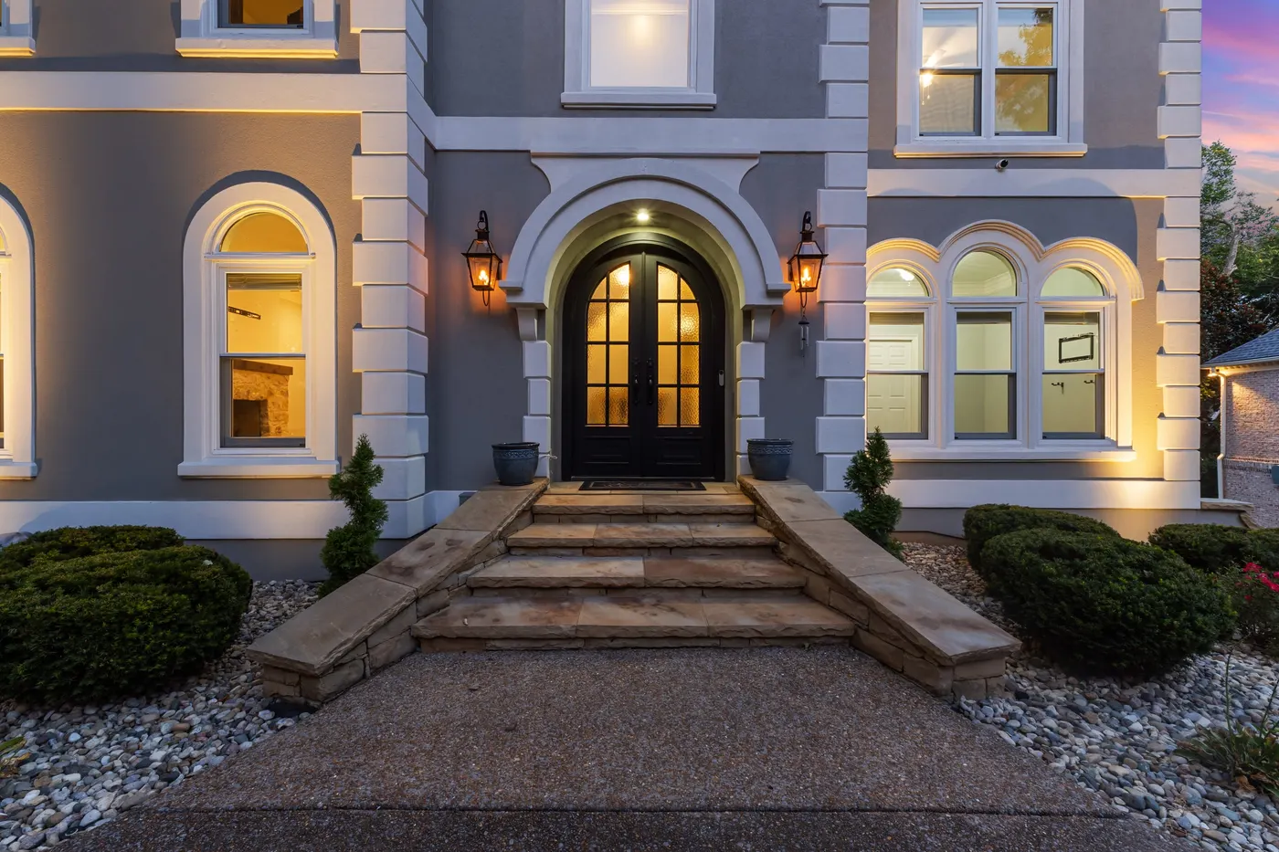 Iron entry door at twilight, shot by Preston Street