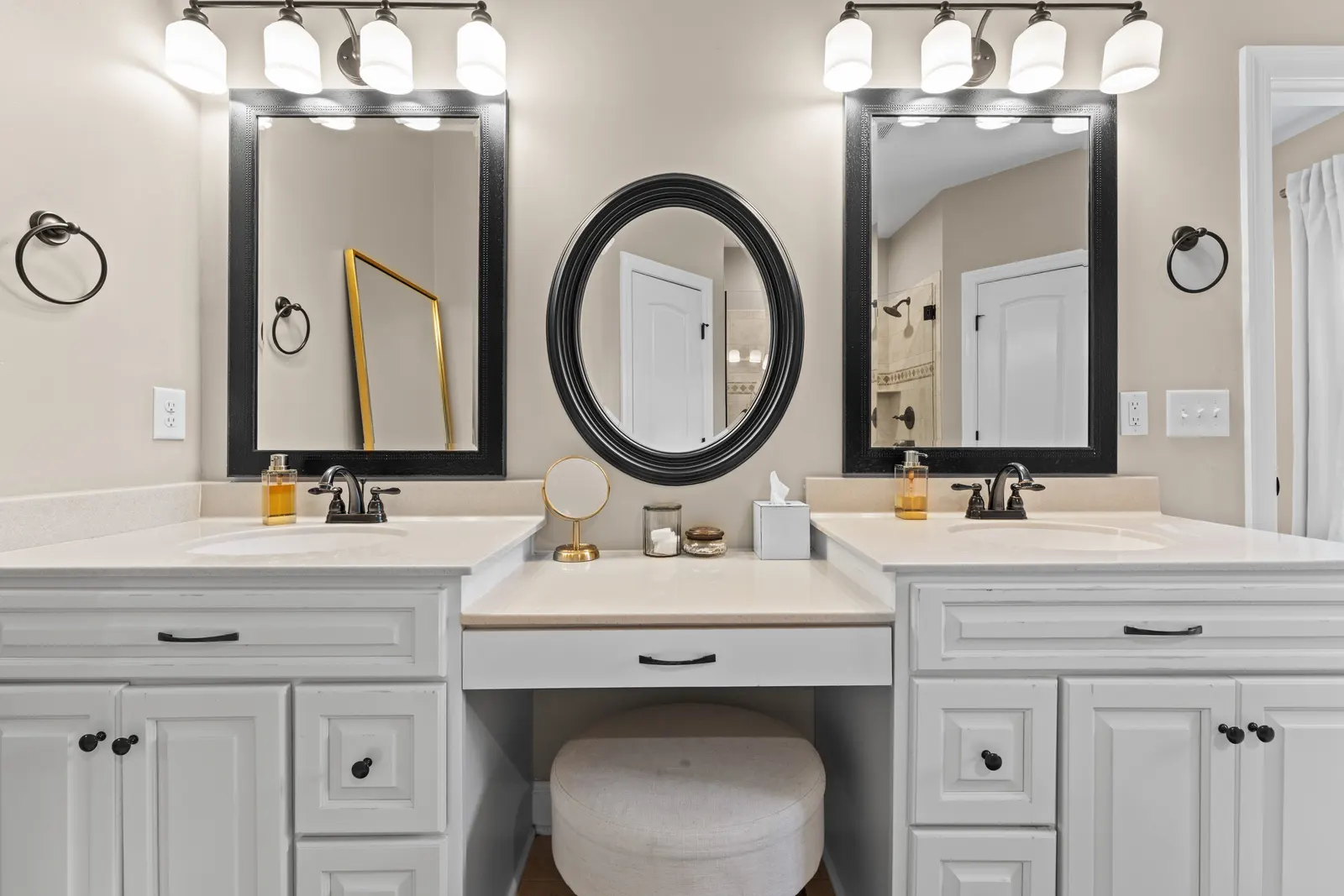 Primary bath with a dual vanity and dressing station