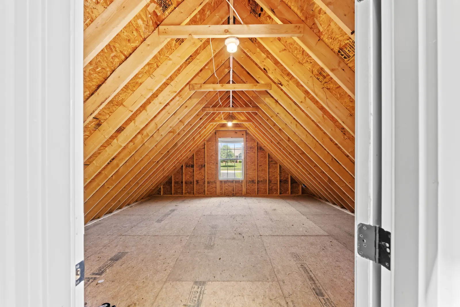 Timber-vaulted bonus room finished above the garage